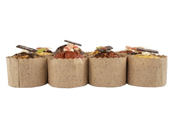 Verschillende smaken muffins in een caisse