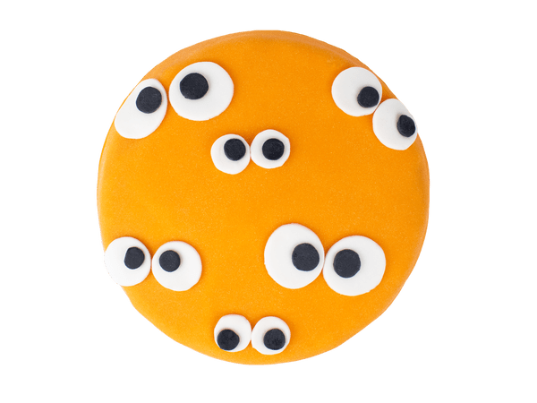 Ronde oranje marsepein taart met decoratie van ogen