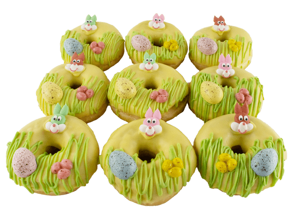 Groene donuts met paasdecoratie